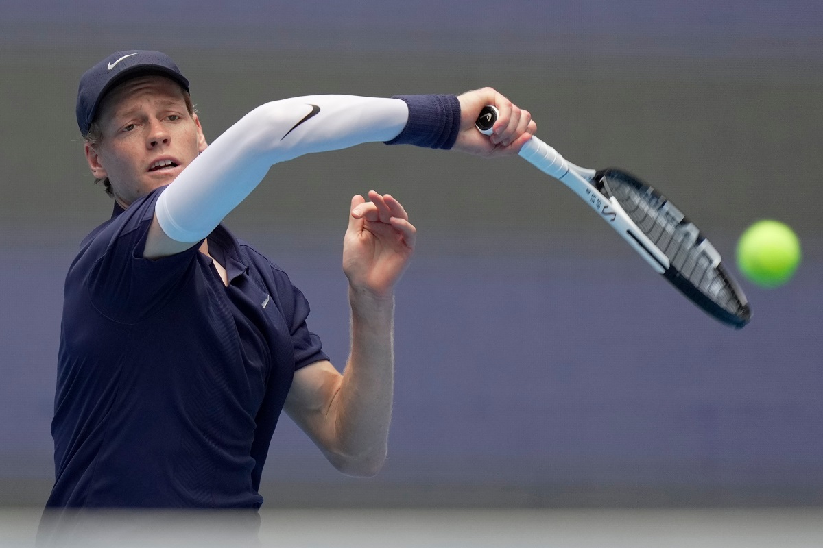 Jannik Sinner of Italy returns a shot to Learner Tien of the United States in the men's singles final match for the China Open tennis tournament in Beijing on Wednesday, Oct. 1, 2025. (AP Photo/Mahesh Kumar A.)