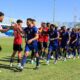 Cape Verde, right, players greet Libyan players before their World Cup 2026 African qualifier Group D soccer match in Tripoli, Libya, Wednesday, Oct. 8, 2025. (AP Photo/Yousef Murad)