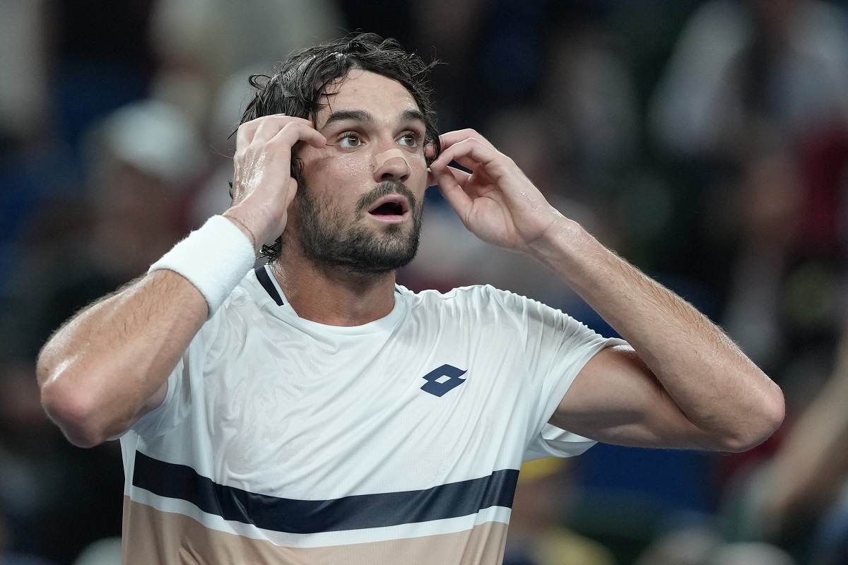 Valentin Vacherot of Monaco reacts after defeating Novak Djokovic of Serbia in the men's singles semifinal match of the Shanghai Masters tennis tournament at Qizhong Forest Sports City Tennis Center, in Shanghai, China, Saturday, Oct. 11, 2025. (AP Photo/Andy Wong)