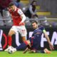 Red Star's Mirko Ivanic fouls Braga's Gabri Martinez to be shown an yellow card during the Europa League opening phase soccer match between SC Braga and Red Star Belgrade in Braga, Portugal, Thursday, Oct. 23, 2025. (AP Photo/Luis Vieira)