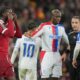 Liverpool's Amara Nallo reacts after shown a red card during the English League Cup fourth round soccer match between Liverpool and Crystal Palace in Liverpool, England, Wednesday, Oct. 29, 2025. (AP Photo/Jon Super)