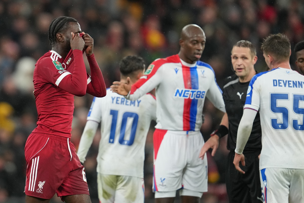 Liverpool's Amara Nallo reacts after shown a red card during the English League Cup fourth round soccer match between Liverpool and Crystal Palace in Liverpool, England, Wednesday, Oct. 29, 2025. (AP Photo/Jon Super)