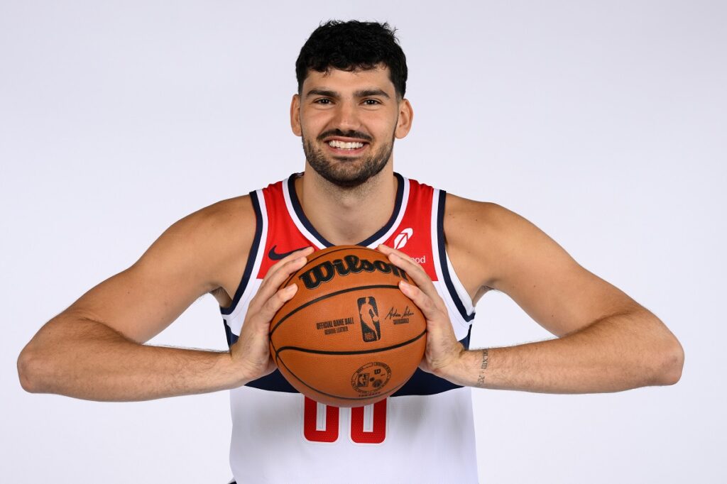 Washington Wizards forward Tristan Vukcevic (00) poses for a photo during the NBA basketball team's media day, Monday, Sept. 29, 2025, in Washington. (AP Photo/Nick Wass)