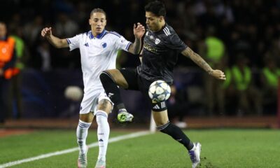 FC Copenhagen's Robert, left, and Qarabag's Matheus Silva fight for the ball during the Champions League opening phase soccer match between Qarabag and FC Copenhagen at the Tofiq Bahramov stadium in Baku, Azerbaijan, Wednesday, Oct. 1, 2025. (AP Photo)