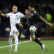 FC Copenhagen's Robert, left, and Qarabag's Matheus Silva fight for the ball during the Champions League opening phase soccer match between Qarabag and FC Copenhagen at the Tofiq Bahramov stadium in Baku, Azerbaijan, Wednesday, Oct. 1, 2025. (AP Photo)