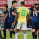Japan players celebrate after a goal during the friendly soccer match between Japan and Brazil Tuesday, Oct. 14, 2025, in Tokyo. (AP Photo/Eugene Hoshiko)