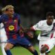 SG's Nuno Mendes fouls Barcelona's Lamine Yamal during the Champions League opening phase soccer match between Barcelona and Paris Saint-Germain at the Lluis Companys Olympic Stadium in Barcelona, Spain, Wednesday, Oct.1, 2025. (AP Photo/Emilio Morenatti)