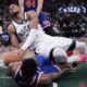 Milwaukee Bucks' Giannis Antetokounmpo is fouled by New York Knicks' OG Anunoby during the second half of an NBA basketball game Tuesday, Oct. 28, 2025, in Milwaukee. (AP Photo/Morry Gash)
