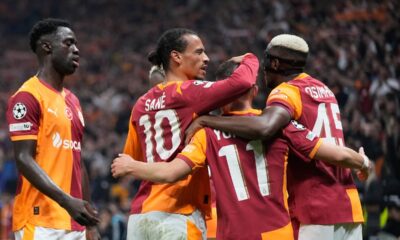 Galatasaray's Yunus Akgun, front, celebrates with teammates after scoring his side's third goal during the Champions League opening phase soccer match between Galatasaray and Bodo Glimt, in Istanbul, Turkey, Wednesday, Oct. 22, 2025. (AP Photo/Khalil Hamra)