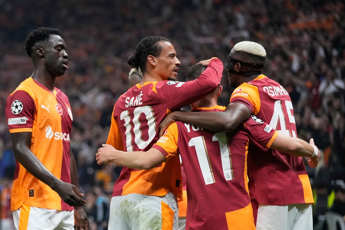 Galatasaray's Yunus Akgun, front, celebrates with teammates after scoring his side's third goal during the Champions League opening phase soccer match between Galatasaray and Bodo Glimt, in Istanbul, Turkey, Wednesday, Oct. 22, 2025. (AP Photo/Khalil Hamra)