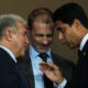 UEFA President Aleksander Ceferin, center, FC Barcelona president Joan Laporta, left, and PSG president Nasser Al-Khelaifi speak before the Champions League opening phase soccer match between Barcelona and Paris Saint-Germain at the Lluis Companys Olympic Stadium in Barcelona, Spain, Wednesday, Oct.1, 2025. (AP Photo/Emilio Morenatti)