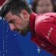 Novak Djokovic of Serbia cools himself with water during the men's singles semifinal match with Valentin Vacherot of Monaco, at the Shanghai Masters tennis tournament at Qizhong Forest Sports City Tennis Center, in Shanghai, China, Saturday, Oct. 11, 2025. (AP Photo/Andy Wong)