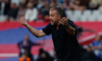 Barcelona's head coach Hansi Flick reacts during a La Liga soccer match between Barcelona and Girona in Barcelona, Spain, Saturday, Oct. 18, 2025. AP Photo/Joan Monfort)