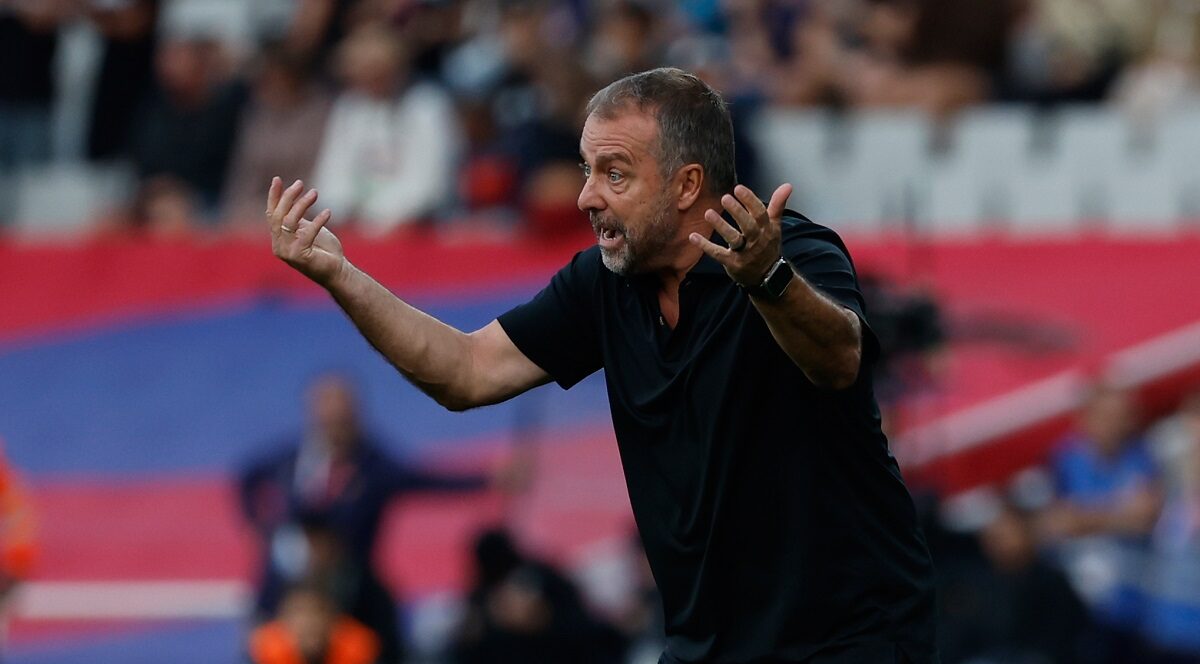 Barcelona's head coach Hansi Flick reacts during a La Liga soccer match between Barcelona and Girona in Barcelona, Spain, Saturday, Oct. 18, 2025. AP Photo/Joan Monfort)
