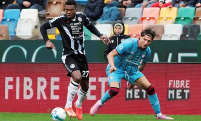 Udinese's Christian Kabasele, left, controls the ball from Cagliari's Gennaro Borrelli during a Serie A soccer match between Udinese and Cagliari at the Bluenergy Stadium in Udine, north eastern Italy, Sunday, Oct. 5, 2025. (Andrea Bressanutti/LaPresse via AP)
