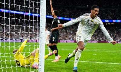 Real Madrid's Jude Bellingham celebrates after scoring his sides first goal during the Champions League opening phase soccer match between Real Madrid and Juventus in Madrid, Spain, Wednesday, Oct. 22, 2025. (AP Photo/Manu Fernandez)