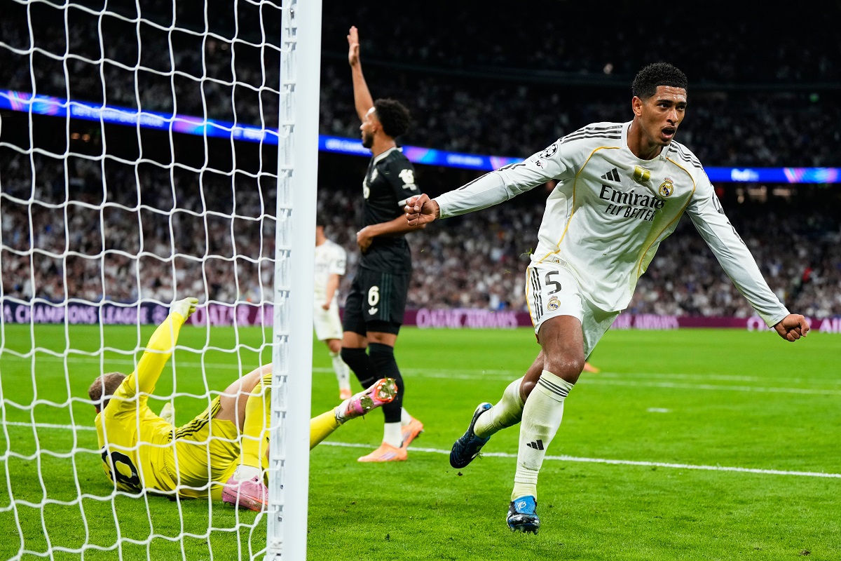Real Madrid's Jude Bellingham celebrates after scoring his sides first goal during the Champions League opening phase soccer match between Real Madrid and Juventus in Madrid, Spain, Wednesday, Oct. 22, 2025. (AP Photo/Manu Fernandez)