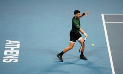 Novak Djokovic of Serbia plays a shot against Yannick Hanfmann of Germany during the ATP250 tournament semifinal tennis match, in Athens, Greece, Friday, Nov. 7, 2025. (AP Photo/Thanassis Stavrakis)