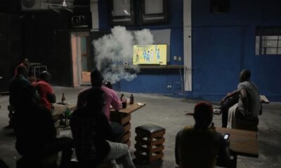 Fans watch a 2026 FIFA World Cup qualifying match between Haiti and Nicaragua, in Port-au-Prince, Haiti, Tuesday, Nov. 18, 2025. (AP Photo/Odelyn Joseph)