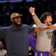 Los Angeles Lakers' LeBron James, left, and Jaxson Hayes gesture during the second half of an NBA basketball game against the San Antonio Spurs, Wednesday, Nov. 5, 2025, in Los Angeles. (AP Photo/Mark J. Terrill)