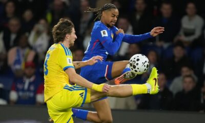 France's Bradley Barcola fights for the ball against Ukraine's Illia Zabarnyi during a World Cup 2026 group D qualifying soccer match between France and Ukraine in Paris, Thursday, Nov. 13, 2025. (AP Photo/Christophe Ena)