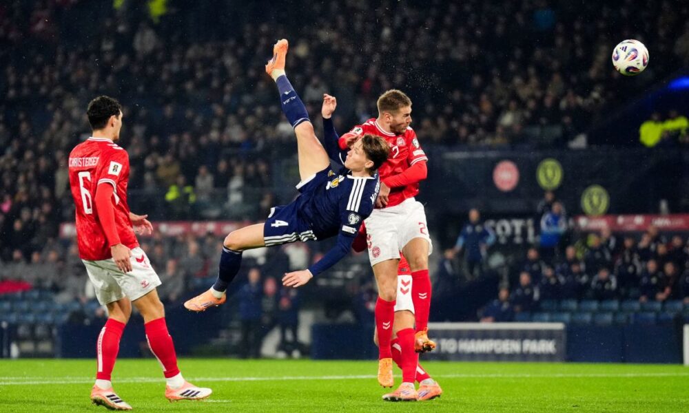 Scotland's Scott McTominay scores the opening goal during the 2026 World Cup European Qualifying soccer match between Scotland and Denmark at Hampden Park, Glasgow, Scotland, Tuesday, Nov. 18, 2025. (Andrew Milligan/PA via AP)