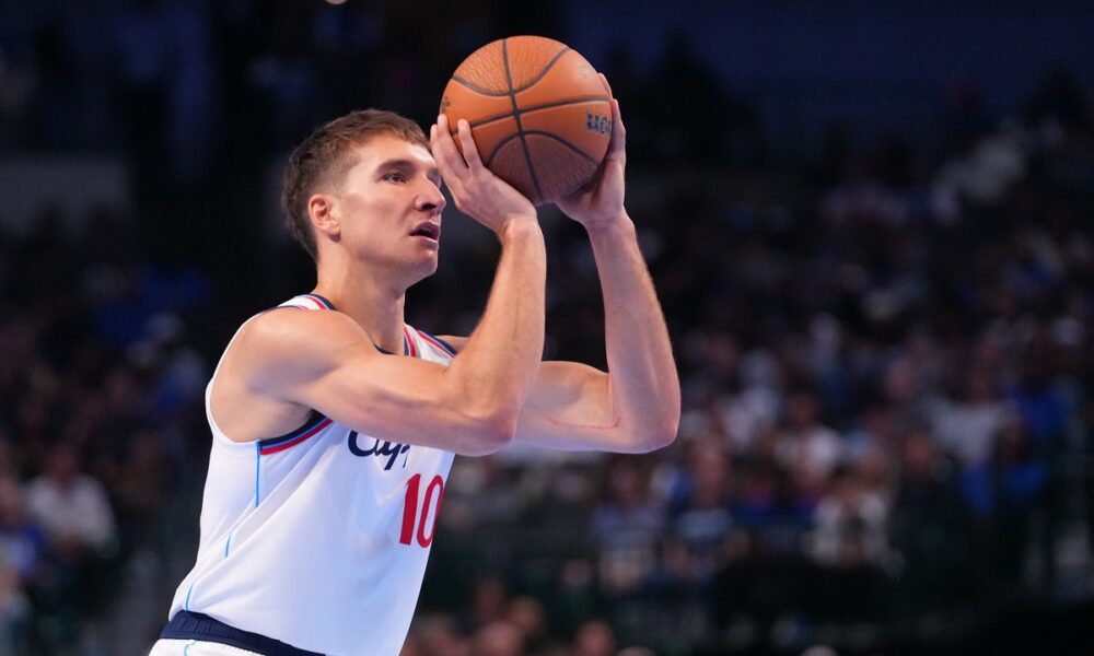 Los Angeles Clippers guard Bogdan Bogdanovic shoots against the Dallas Mavericks during the second half of an NBA Cup basketball game Friday, Nov. 14, 2025, in Dallas. (AP Photo/Julio Cortez)