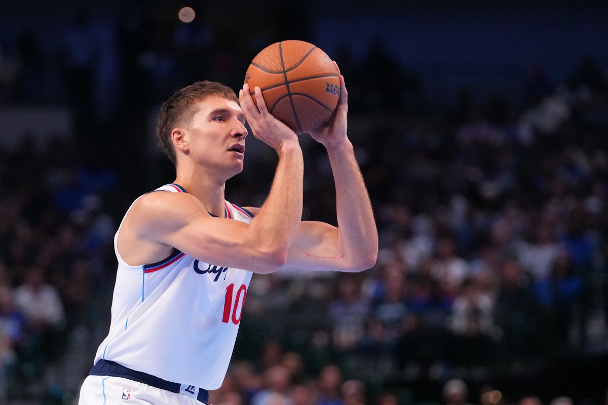 Los Angeles Clippers guard Bogdan Bogdanovic shoots against the Dallas Mavericks during the second half of an NBA Cup basketball game Friday, Nov. 14, 2025, in Dallas. (AP Photo/Julio Cortez)