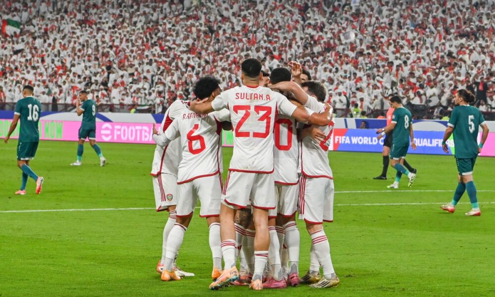 UAE players celebrate after their teammate Luan Pereira scored his side's opening goal during the 2026 World Cup play off first leg soccer match between UAE and Iraq in Abu Dhabi, United Arab Emirates, Thursday, Nov. 13, 2025. (AP Photo/Walid Ibrahim)