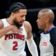 Detroit Pistons guard Cade Cunningham (2) talks to referee Tre Maddox (23) in the first half of an NBA basketball game Monday, Nov. 3, 2025, in Memphis, Tenn. (AP Photo/Brandon Dill)