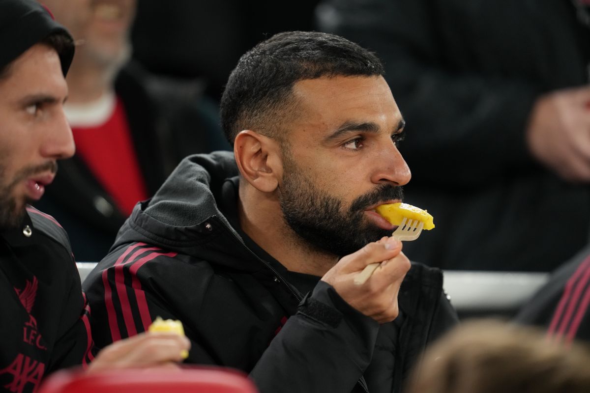 Liverpool's Mohamed Salah sits on the bench before an English League Cup fourth round soccer match between Liverpool and Crystal Palace in Liverpool, England, Wednesday, Oct. 29, 2025. (AP Photo/Jon Super)