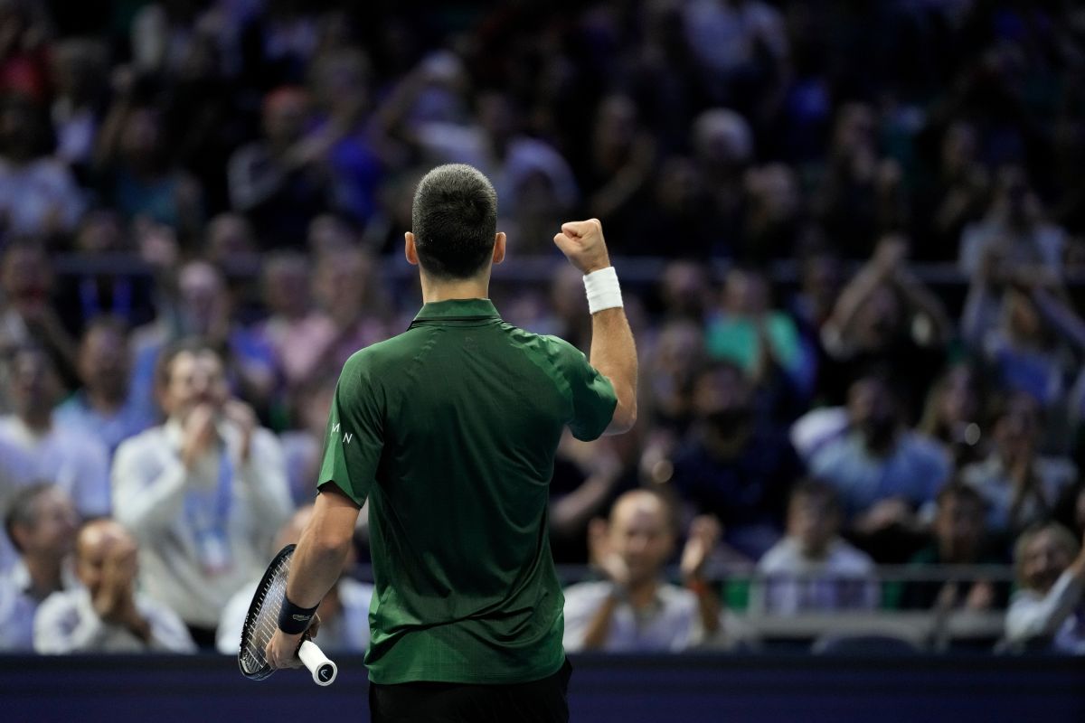 Novak Djokovic of Serbia celebrates after winning the ATP tournament round of 16 tennis match against Alejandro Tabilo of Chile, in Athens, Greece, Tuesday, Nov. 4, 2025. (AP Photo/Petros Giannakouris)