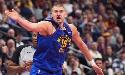 Denver Nuggets center Nikola Jokić argues for a call in the second half of an NBA Cup basketball game against the San Antonio Spurs Friday, Nov. 28, 2025, in Denver. (AP Photo/David Zalubowski)