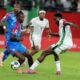 DR Congo's Ngal'ayel Mukau challenges Nigeria's Wilfred Ndidi during the World Cup African qualifier soccer match between DR Congo and Nigeria, in Rabat, Morocco, Sunday, Nov. 16, 2025. (AP Photo)