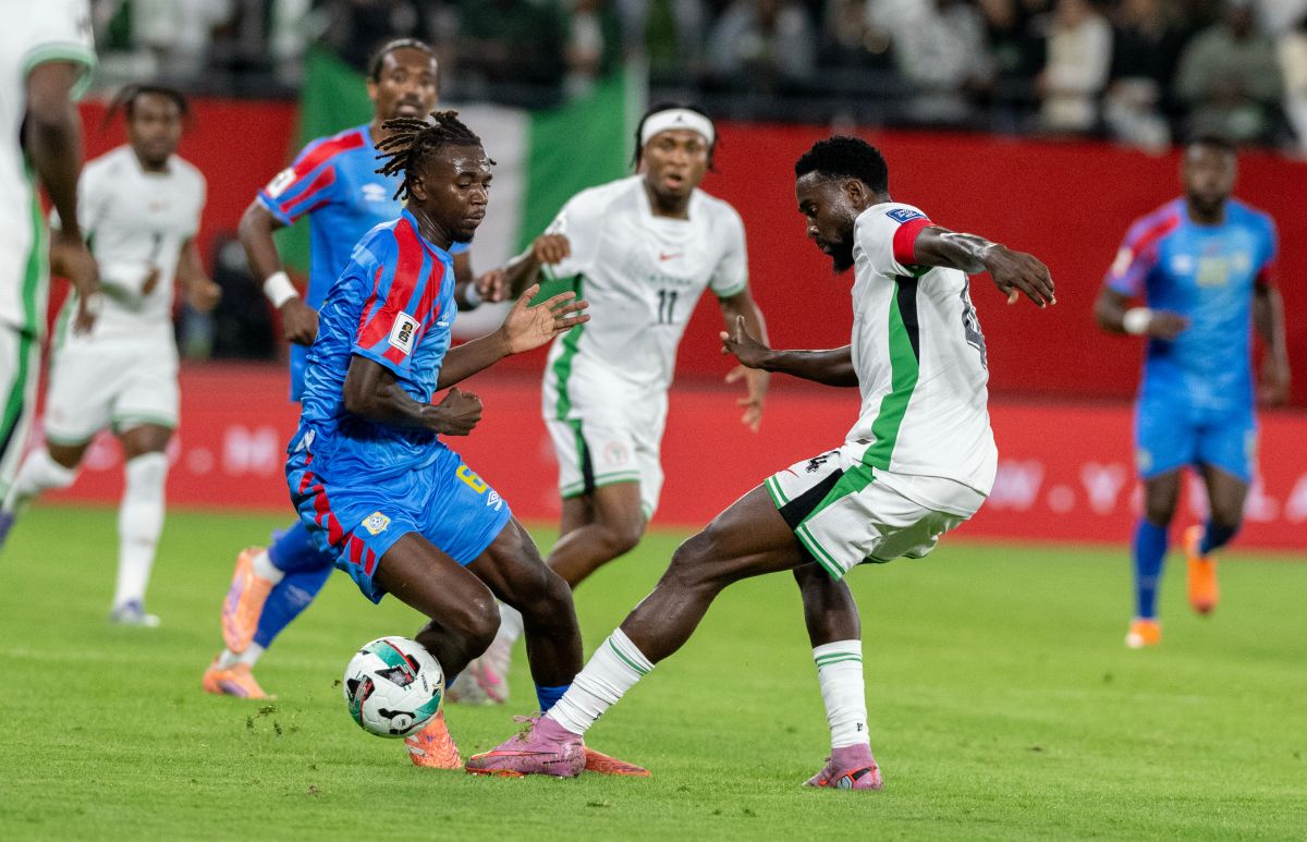 DR Congo's Ngal'ayel Mukau challenges Nigeria's Wilfred Ndidi during the World Cup African qualifier soccer match between DR Congo and Nigeria, in Rabat, Morocco, Sunday, Nov. 16, 2025. (AP Photo)