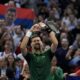 Novak Djokovic of Serbia celebrates after his win against Yannick Hanfmann of Germany during the ATP250 tennis tournament, in Athens, Greece, Friday, Nov. 7, 2025. (AP Photo/Thanassis Stavrakis)