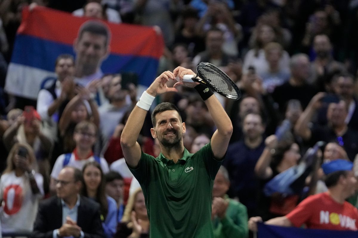 Novak Djokovic of Serbia celebrates after his win against Yannick Hanfmann of Germany during the ATP250 tennis tournament, in Athens, Greece, Friday, Nov. 7, 2025. (AP Photo/Thanassis Stavrakis)