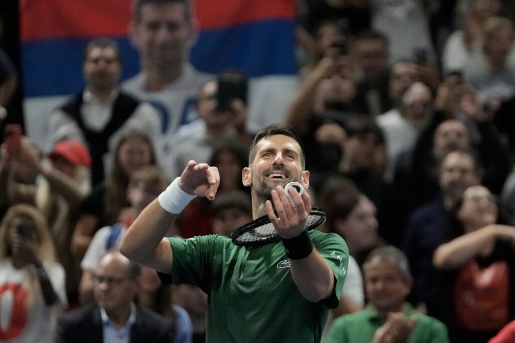 Novak Djokovic of Serbia celebrates after his win against Yannick Hanfmann of Germany during the ATP250 tennis tournament, in Athens, Greece, Friday, Nov. 7, 2025. (AP Photo/Thanassis Stavrakis)