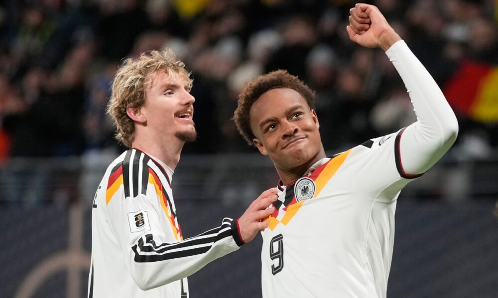 Germany's Assan Ouedraogo reacts after scoring during a group A World Cup qualifiying soccer match between Germany and Slovakia in Leipzig, Germany, Monday, Nov. 17, 2025. (AP Photo/Matthias Schrader)