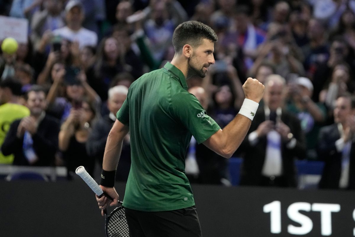 Novak Djokovic of Serbia celebrates after his win against Yannick Hanfmann of Germany during the ATP250 tennis tournament, in Athens, Greece, Friday, Nov. 7, 2025. (AP Photo/Thanassis Stavrakis)