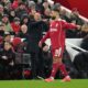 Liverpool's Mohamed Salah, right, and manager Arne Slot gesture during the English Premier League soccer match between Liverpool and Sunderland in Liverpool, Wednesday, Dec. 3, 2025. (AP Photo/Jon Super)