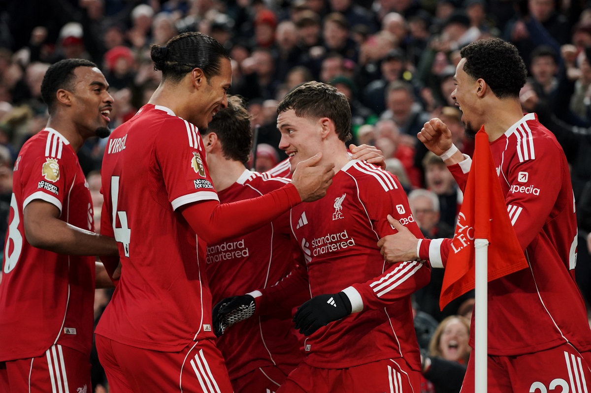 Liverpool's Florian Wirtz, center, celebrates with teammates after scoring his side's second goal during the English Premier League soccer match between Liverpool and Wolverhampton Wanderers in Liverpool, Sunday, Dec. 27, 2025. (AP Photo/Ian Hodgson)