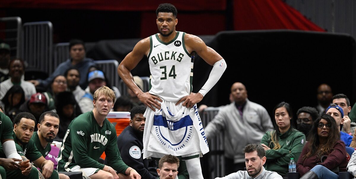 Milwaukee Bucks forward Giannis Antetokounmpo (34) watches the action while resting during the second half of an NBA basketball game against the Washington Wizards, Monday, Dec. 1, 2025, in Washington. (AP Photo/John McDonnell)