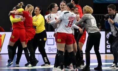 Serbia's players celebrate their win over Spain after the women's handball World Championship match between Spain and Serbia in Dortmund, Germany, Tuesday, Dec. 2, 2025. (Federico Gambarini/dpa via AP)