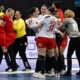 Serbia's players celebrate their win over Spain after the women's handball World Championship match between Spain and Serbia in Dortmund, Germany, Tuesday, Dec. 2, 2025. (Federico Gambarini/dpa via AP)
