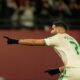 Algeria's Riyad Karim Mahrez celebrates after scoring his side's first goal during the Africa Cup of Nations group E soccer match between Algeria and Burkina Faso in Fez, Morocco, Sunday, Dec. 28, 2025. (AP Photo/Mosa'ab Elshamy)