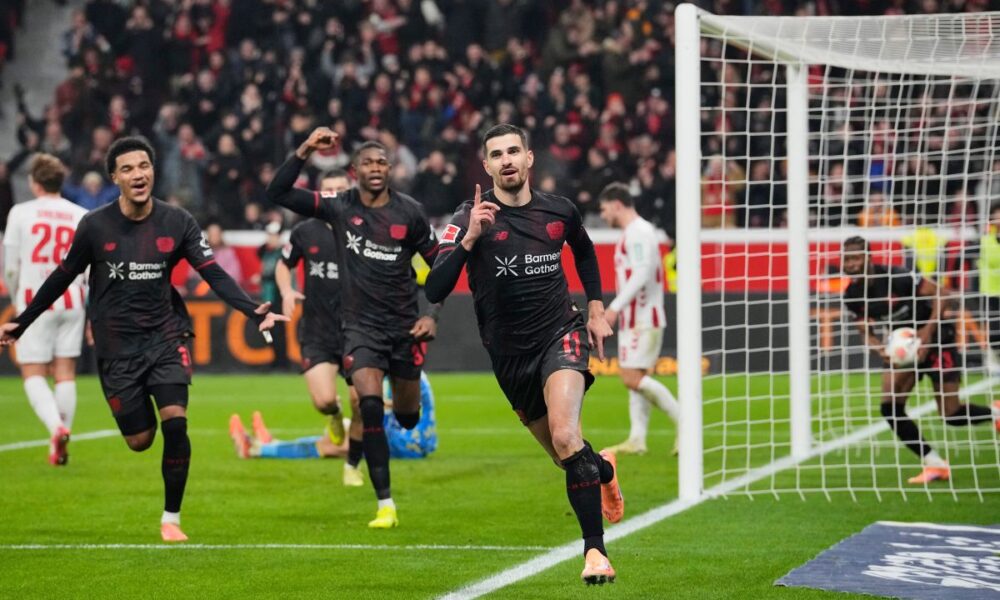Leverkusen's Martim Terrier celebrates after he scored the opening goal during the German Bundesliga soccer match between Bayer 04 Leverkusen and 1.FC Cologne in Leverkusen, Germany, Saturday, Dec. 13, 2025. (AP Photo/Martin Meissner)