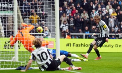 Newcastle's Nick Woltemade, right, scores the opening goal during the English Premier League soccer match between Newcastle United and FC Chelsea in Newcastle, England, Saturday, Dec. 20, 2025. (Owen Humphreys/PA via AP)