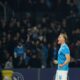 Napoli's Rasmus Hojlund celebrates after scoring the opening goal during the Serie A soccer match between Napoli and Juventus, in Naples, Italy, Sunday, Dec. 7, 2025. (Alessandro Garofalo/LaPresse via AP)