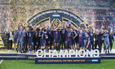 PSG's Goncalo Ramos lifts the trophy after winning the FIFA Intercontinental Cup final soccer match between Flamengo and Paris Saint-Germain in Doha, Qatar, Wednesday, Dec. 17, 2025. (AP Photo/Hussein Sayed)
